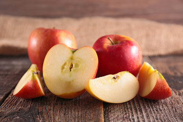 Wall Mural - fresh red apple on wood