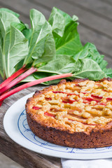 Wall Mural - Homemade rhubarb pie on wooden table.