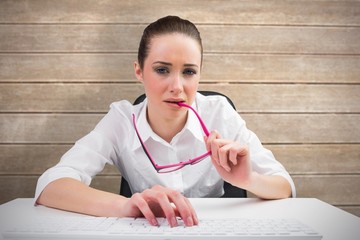 Aufkleber - Composite image of businesswoman typing on a keyboard