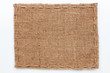 Frame of burlap  lies on a white  background