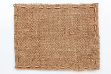 Frame Of Burlap  Lies On A White  Background