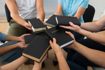 Sticker - Group Of People Holding Holy Bible