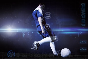 Poster - Composite image of football player kicking ball