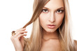 © julenochek - Woman with long straight blond hairs isolated