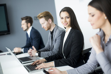 Wall Mural - Young people in the office