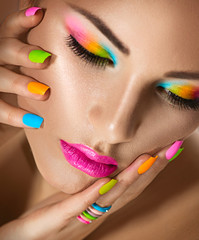 Poster - Beauty girl portrait with vivid makeup and colorful nailpolish
