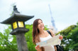 Travel in Tokyo - Asian tourist woman with map