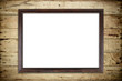 © blackzheep - old picture frame on wood background