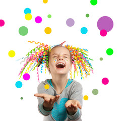 Joyful girl catches multi-colored confetti