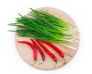 Wall Mural - Bunch of green onion with red pepper.