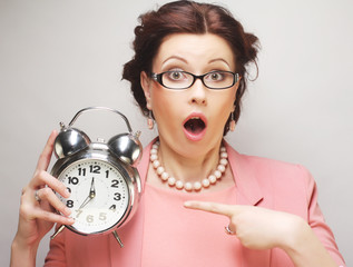 fun businesswoman with alarmclock