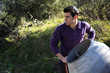 © theartofphoto - Young man working with a cement mixer
