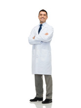 Smiling Male Doctor In White Coat