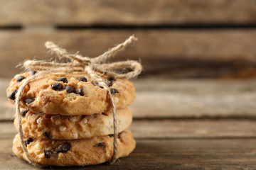 Sticker - Tasty cookies on rustic wooden background