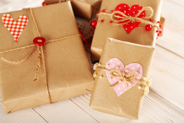 Wall Mural - Beautiful gift boxes on wooden background. Valentine Day