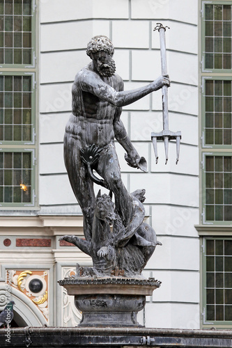 Naklejka na szafę Fountain from Neptune statue on old city in gdansk.