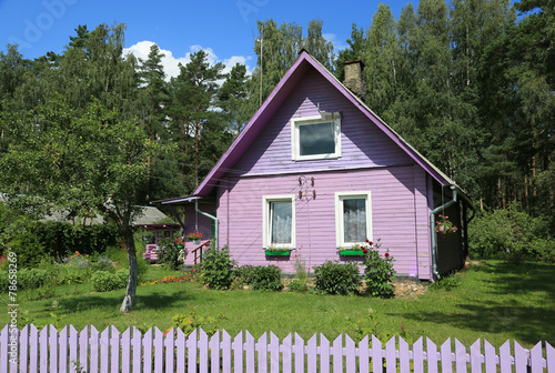 Lila Holzhaus Mit Garten 2 Buy This Stock Photo And Explore