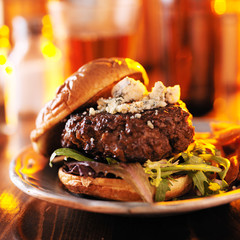 Wall Mural - burger in warm light with sweet potato fries