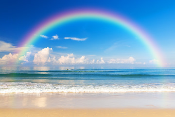 beautiful sea with a rainbow in the sky