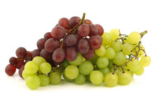 Fresh Red And White Seedless  Grapes On The Vine
