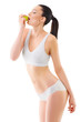 © chettythomas - Slim woman in white underwear with green apple at her hands over