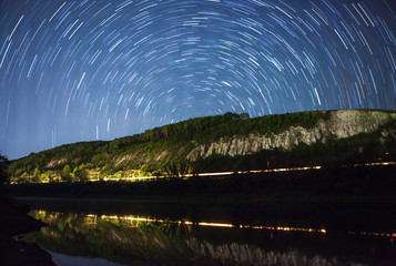 Wall Mural - a beautiful night sky, milky way, star trails and the trees