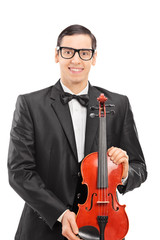 Sticker - Vertical shot of a young musician posing with a violin