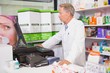© WavebreakMediaMicro - Senior pharmacist using the computer