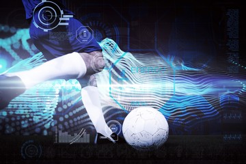 Wall Mural - Composite image of football player kicking ball