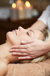 © Syda Productions - close up of woman having face massage in spa