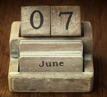 A Very Old Wooden Vintage Calendar Showing The Date 7th June On