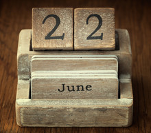 A Very Old Wooden Vintage Calendar Showing The Date 22nd June On
