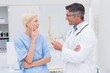 © WavebreakMediaMicro - Doctor and nurse discussing in clinic