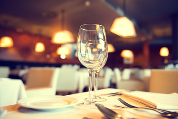 Served dinner table in a restaurant. Restaurant interior