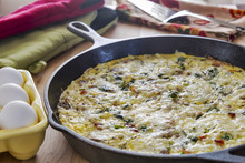 Frittata In A Cast Iron Skillet With Eggs, Broccoli & Spinach