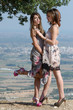 © Domforstock - Outdoor fashion shot of two young womens in dress