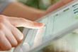 © Rasulov - Hand touching screen on modern digital tablet pc.