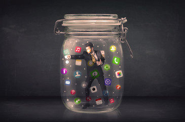 Poster - Businessman captured in a glass jar with colourful app icons con