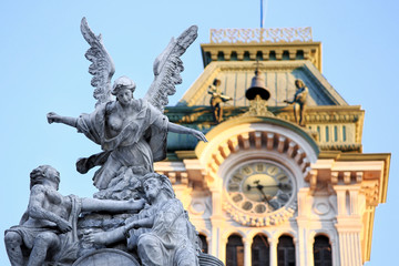 DETAIL OF STATUES TO uNITà SQUARE WITH TrIESTE TOWEN HALL IN THE