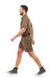 © studioloco - Walking man in khaki uniform