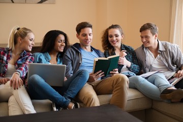 Students preparing for exams in apartment interior