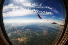 Looking Out The Window Of A Plane