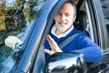 Wall Mural - Man driving his car