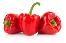 Studio Shot Of Red Bell Peppers Isolated On White