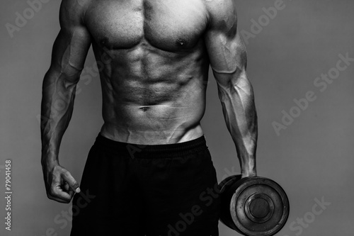 Fototapeta do kuchni muscular bodybuilder guy close up monochrome