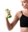 © chettythomas - Fitness woman working out with dumbbell