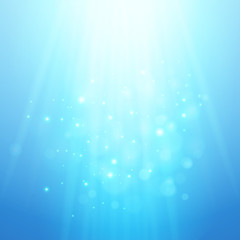 Wall Mural - Blue rays of light. Vector bokeh blurred background