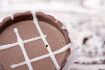 Dark chocolate on wooden background