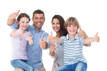 Wall Mural - Happy family gesturing thumbs up