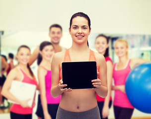 Canvas Print - sporty woman with tablet pc blank screen